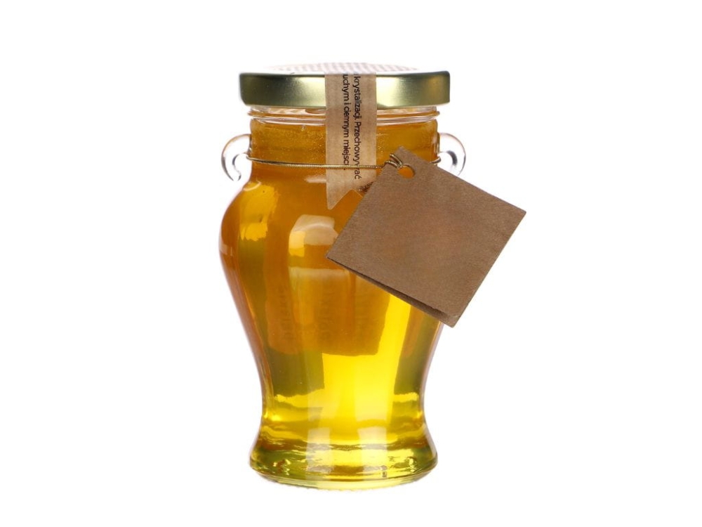 Miód pszczeli wielokwiatowy w ozdobnym słoiku Amfora. Naturalny, aromatyczny miód nektarowy, idealny do herbaty, deserów i wypieków. Elegancki słoik sprawia, że produkt jest idealny jako prezent.